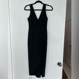 Flattering black dress perfect for a wedding or formal event. New with tags!